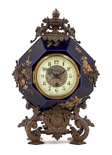 * A French Bronze Mounted Porcelain Clock Height 15 1/2 inches.