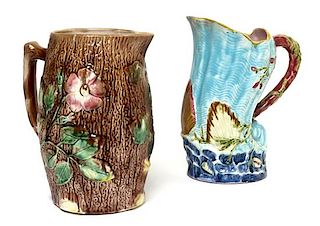 Two Majolica Pitchers Height of taller 10 inches.