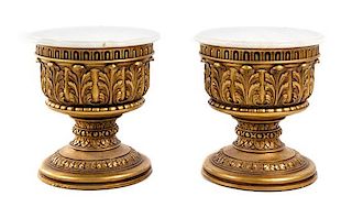 A Pair of Giltwood Pedestals Height 17 3/4 x diameter of top 17 1/2 inches.