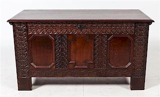 A Continental Carved Oak Chest Height 26 x width 48 1/2 x depth 21 inches.