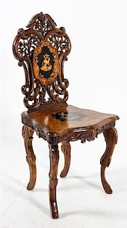 A Black Forest Carved Chair Height 37 3/4 inches.