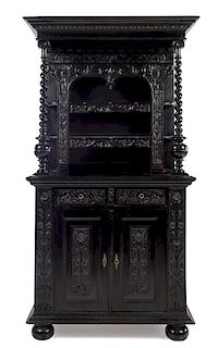 * A Dutch Black Painted Cupboard Height 80 x width 42 x depth 21 1/2 inches.