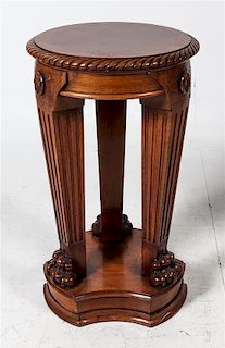 A William IV Style Mahogany Pedestal Table Height 30 1/4 x diameter of top 17 1/2 inches.