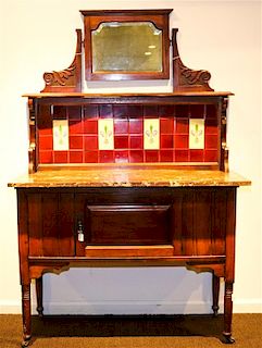 A Victorian Tile Inset Washstand Height 62 x width 41 3/4 x depth 18 1/2 inches.
