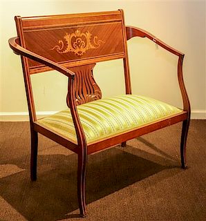 * An Edwardian Marquetry and Mother-of-Pearl Inlaid Open Armchair Height 35 x width 36 x depth 19 inches.