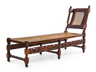 * A William and Mary Oak Chaise Longue Height 35 1/2 x width 63 1/4 x depth 19 1/2 inches.