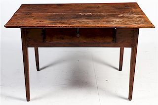 An English Oak Tavern Table Height 26 1/2 x width 42 3/4 x depth 28 inches.