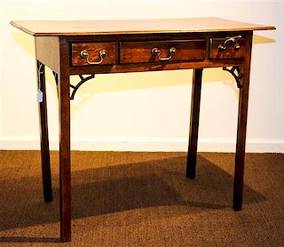 A George III Style Mahogany Side Table Height 28 1/2 x width 34 x depth 16 1/2 inches.