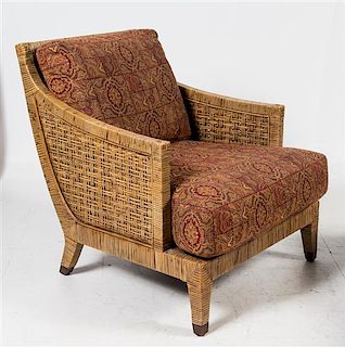 A Wicker Armchair Height 32 x width 30 x depth 30 1/2 inches.