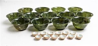 A Group of Thirteen Hardstone Bowls Height of first 2 x diameter 4 inches.