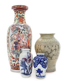 * Four Chinese Porcelain Vases Height of tallest 24 inches.