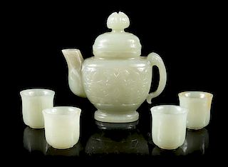 A Chinese Celadon Jade Teapot and Four Jade Teacups Height 4 1/4 inches.