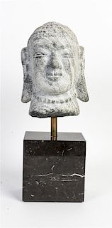 A Chinese Carved Stone Head of Buddha Height of head 10 1/4 inches.