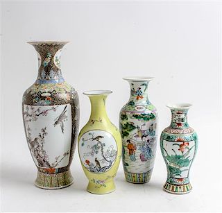 * Four Porcelain Vases Height of tallest 13 1/4 inches.