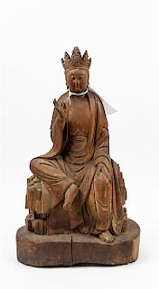 * A Carved Wood Figure of Guanyin Height 22 3/4 inches.