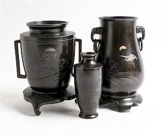 * Three Mixed Metal Vases Height of tallest 9 inches.