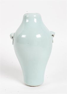 A Celadon Glazed Porcelain Vase Height 8 inches.