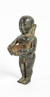 A Bronze Figure of a Buddha Boy Length 6 1/2 inches.