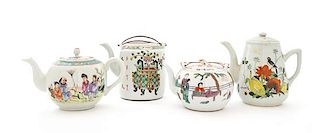 Four Chinese Famille Rose Porcelain Teapots Height of largest 6 1/2 inches.