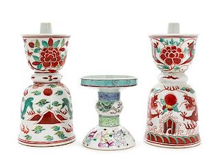Three Chinese Enameled Porcelain Candlesticks Height of tallest 9 1/2 inches.
