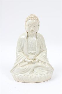 A Japanese White Glazed Porcelain Figure of Buddha Height 9 inches.