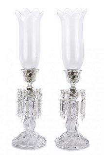 A Pair of Baccarat Glass Candlesticks, Height 22 1/4 inches.