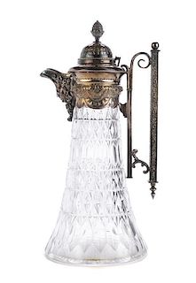 An Electroplate and Colorless Cut Glass Ewer, Height 12 1/2 inches.