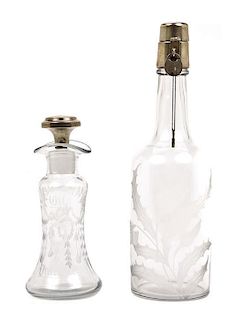 A Pair of Cut Glass and Silver Bottles. Height of taller 12 inches.