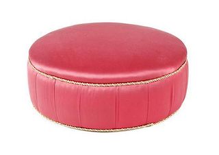 A Large Coccio Pink Fabric-Upholstered Ottoman, Height 17 x diameter 42 1/2 inches.