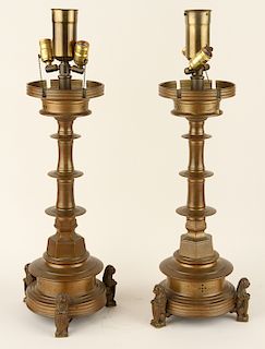 PAIR BRASS TORCHIERES RAISED ON LION FIGURES