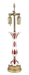 A Red and White Cased Glass Table Lamp, Height 22 1/2 inches.