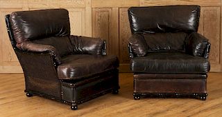 PAIR LEATHER UPHOLSTERED ARM CHAIRS CANED BACK