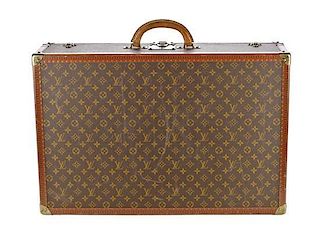 A Louis Vuitton Large Hardsided Suitcase.