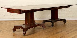 A TWO PART EMPIRE MAHOGANY DINING TABLE C 1850