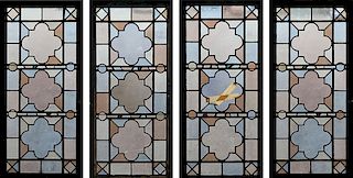 LOT OF FOUR STAINED GLASS PANELS IN METAL FRAMES