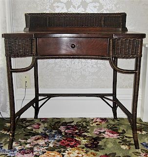 A Victorian Oak and Wicker Dressing Table, Heywood Wakefield, Height 34 x width 32 1/2 x depth 21 inches.
