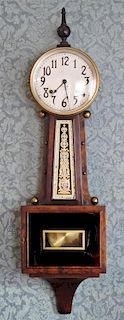 An American Banjo Clock, Height 38 inches.