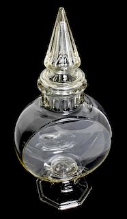 A Clear Glass Apothecary Jar, Height 23 inches.