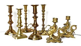 A Collection of Brass Candlesticks, Height of first 8 inches.