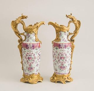 PAIR OF LOUIS XV STYLE GILT-BRONZE-MOUNTED FAMILLE ROSE STYLE PORCELAIN EWERS, PROBABLY SAMSON