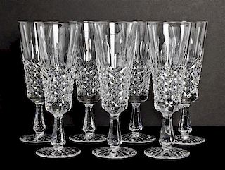 Seven Waterford Champagne Flutes, Height 7 1/2 inches.