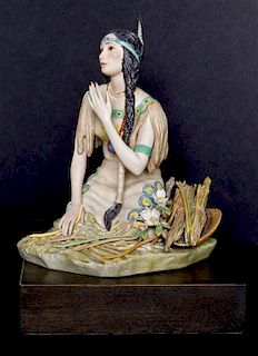 A Cybis Porcelain Figure of a Native American Woman, Height with base 10 1/2 x width 7 1/2 x depth 8 1/2 inches.