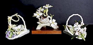 Two Cybis Porcelain Floral Baskets, Height of first 5 1/2 x width 5 1/2 x depth 5 inches.