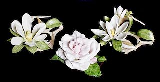 Two Cybis Porcelain Magnolia Blossoms on Branches, Height of first 4 1/2 x width 8 1/2 x depth 7 inches.