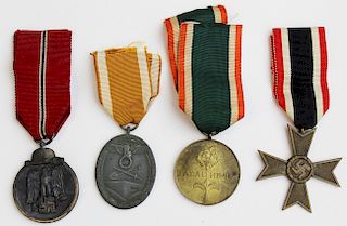 four WWII German medals with ribbons