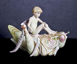 A Cybis Porcelain Figural Group, Height 5 x width 6 x depth 4 1/2 inches.
