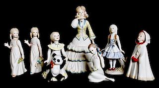 A Group of Seven Cybis Porcelain Figures of Girls, Height of first 9 3/4 inches.