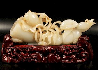 19TH C. CHINESE CARVED WHITE JADE ON STAND