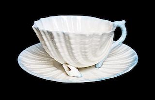A Belleek Neptune Teacup and Saucer, Diameter of saucer 5 1/8 inches.
