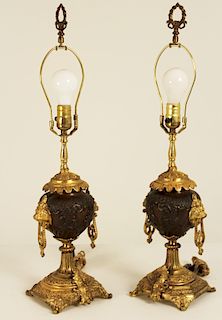 PAIR OF FRENCH BRONZE AND GILT URNS, AS LAMPS
